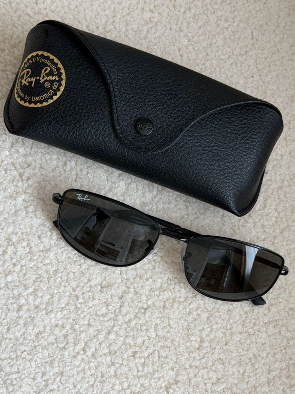 Ray-Ban Black Frame Sunglasses with Grey Lenses